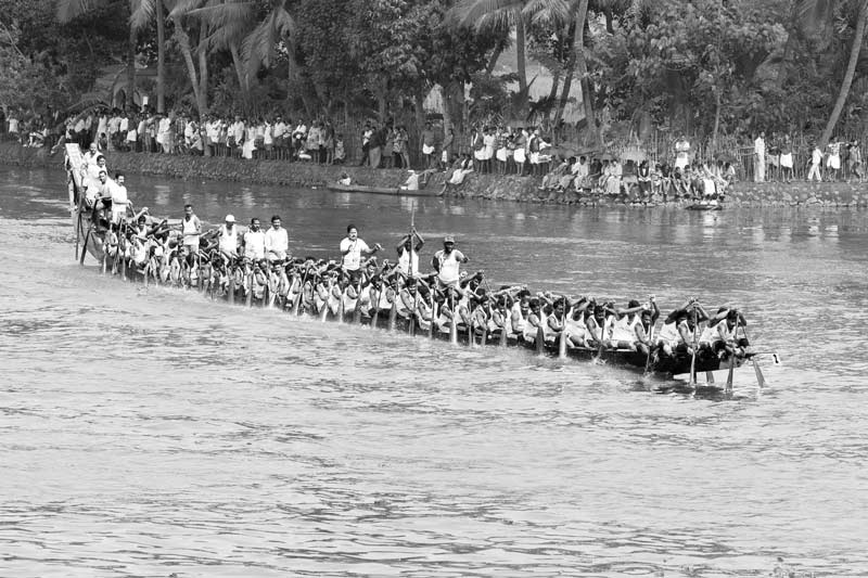 Living Below the Sea Level - Payippad boat race in progress on Payippad river, a tributary of Achencoil river, in Alappuzha district, Kerala